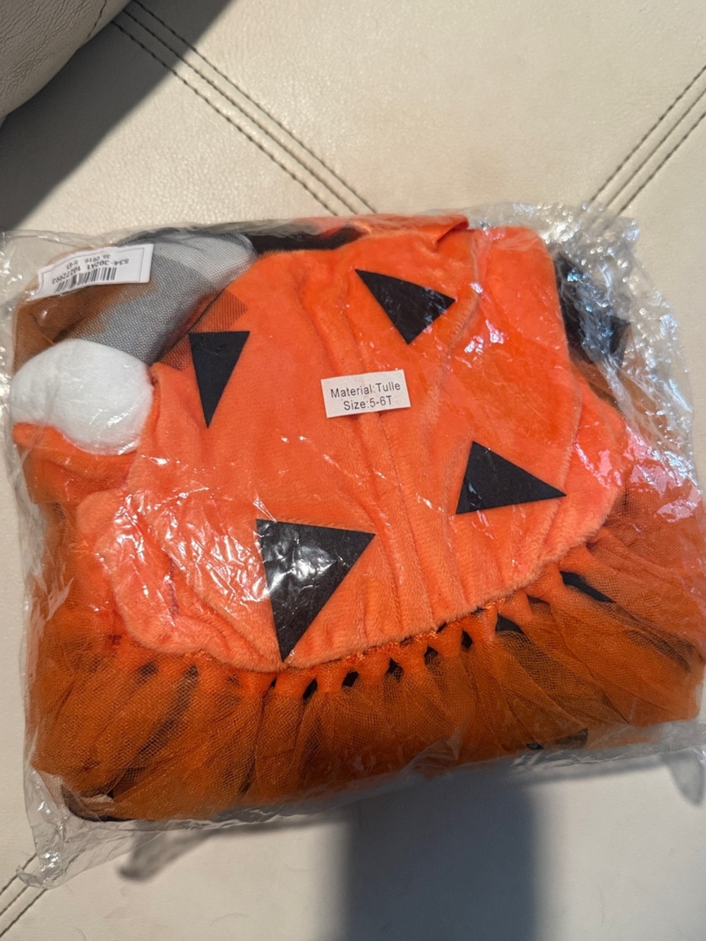 Spirit Pebbles from the Flinstones Costume with Black Jack-O'-Lantern Details